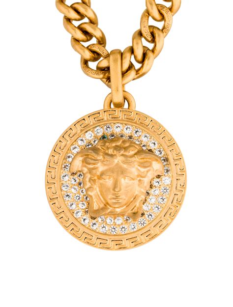 versace pendant and chain.